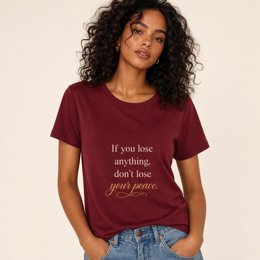 burgundy tee printed with the quote "If you lose anything, don't lose your peace."